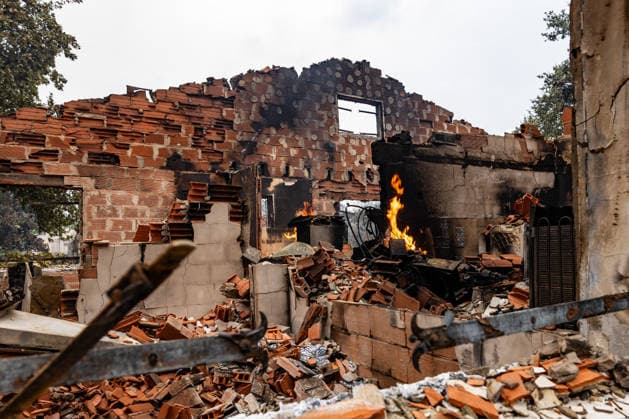 Wildfire evacuees shelter at Bordeaux Exhibition Centre - Bordeaux Burned residential properties are seen after the passage of the wildfire, smoke continues to rise from the affected areas as firefighters monitor remaining hotspots in Lège, France, on July 25, 2026. Photo by Margot Le Gonidec ABACAPRESS.COM Bordeaux France  Copyright: xLexGonidecxMargot ABACAx