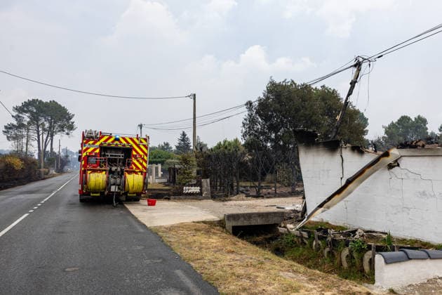 Wildfire evacuees shelter at Bordeaux Exhibition Centre - Bordeaux Burned residential properties are seen after the passage of the wildfire, smoke continues to rise from the affected areas as firefighters monitor remaining hotspots in Lège, France, on July 25, 2026. Photo by Margot Le Gonidec ABACAPRESS.COM Bordeaux France  Copyright: xLexGonidecxMargot ABACAx