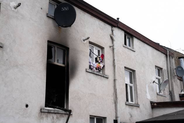 a residential building at the Haachtsesteenweg chaussee de Haecht in Schaarbeek Schaerbeek, Brussels, pictured after last night s fire, Sunday 26 July 2026. Two people died in the fire Eight others were injured. Two of them are in serious condition. The cause of the fire is still under investigation. MARIUS BURGELMAN  MariusxBurgelman 182073295