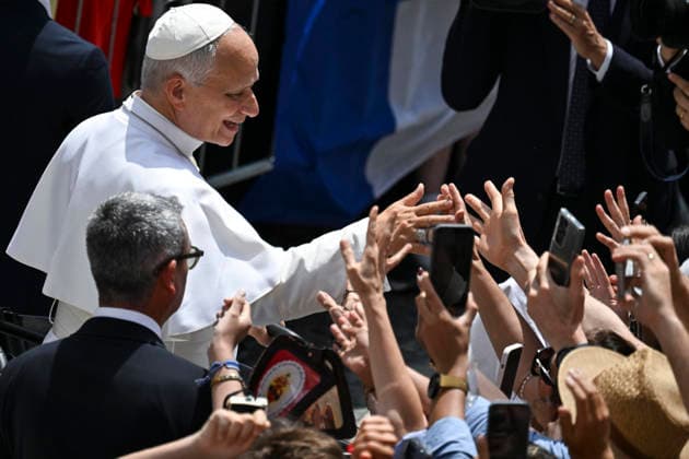 July 26, 2026, Italy, Italy: Pope Leo XIV waves at faithfuls after he delivered the Angelus prayer from the entrance of the Apostolic Palace overlooking Piazza della Liberta at the Papal summer residence in Castel Gandolfo, near Rome, Italy, 26 July 2026. ANSA RICCARDO ANTIMIANI. Italy Italy  - ZUMAa110 20260726_zaf_a110_016 Copyright: xRiccardoxAntimianix