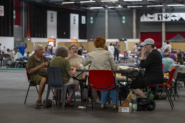 Bordeaux Exhibition Centre Shelters Evacuees from Wildfires BORDEAUX, FRANCE - JULY 26 : The Parc des Expositions de Bordeaux-Lac, located on Cours Jules Ladoumegue, serves as one of the main reception centers for people evacuated due to severe wildfires affecting the Gironde department in southwestern France, providing temporary accommodation, basic services, and logistical support through Gate M as firefighters continue efforts to contain the blaze on July 26, 2026 in Bordeaux, France. Authorities have urged residents to follow official instructions until the situation is brought under control in Bordeaux. Lorena Sopena Lopez Anadolu Bordeaux France. Editorial use only. Please get in touch for any other usage.  Copyright: x2026xAnadoluxLorenaxSopenaxLopezx