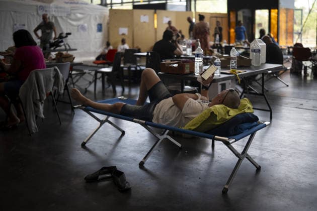 Bordeaux Exhibition Centre Shelters Evacuees from Wildfires BORDEAUX, FRANCE - JULY 26 : The Parc des Expositions de Bordeaux-Lac, located on Cours Jules Ladoumegue, serves as one of the main reception centers for people evacuated due to severe wildfires affecting the Gironde department in southwestern France, providing temporary accommodation, basic services, and logistical support through Gate M as firefighters continue efforts to contain the blaze on July 26, 2026 in Bordeaux, France. Authorities have urged residents to follow official instructions until the situation is brought under control in Bordeaux. Lorena Sopena Lopez Anadolu Bordeaux France. Editorial use only. Please get in touch for any other usage.  Copyright: x2026xAnadoluxLorenaxSopenaxLopezx