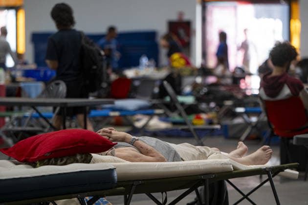 Bordeaux Exhibition Centre Shelters Evacuees from Wildfires BORDEAUX, FRANCE - JULY 26 : The Parc des Expositions de Bordeaux-Lac, located on Cours Jules Ladoumegue, serves as one of the main reception centers for people evacuated due to severe wildfires affecting the Gironde department in southwestern France, providing temporary accommodation, basic services, and logistical support through Gate M as firefighters continue efforts to contain the blaze on July 26, 2026 in Bordeaux, France. Authorities have urged residents to follow official instructions until the situation is brought under control in Bordeaux. Lorena Sopena Lopez Anadolu Bordeaux France. Editorial use only. Please get in touch for any other usage.  Copyright: x2026xAnadoluxLorenaxSopenaxLopezx