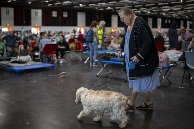 Bordeaux Exhibition Centre Shelters Evacuees from Wildfires BORDEAUX, FRANCE - JULY 26 : The Parc des Expositions de Bordeaux-Lac, located on Cours Jules Ladoumegue, serves as one of the main reception centers for people evacuated due to severe wildfires affecting the Gironde department in southwestern France, providing temporary accommodation, basic services, and logistical support through Gate M as firefighters continue efforts to contain the blaze on July 26, 2026 in Bordeaux, France. Authorities have urged residents to follow official instructions until the situation is brought under control in Bordeaux. Lorena Sopena Lopez Anadolu Bordeaux France. Editorial use only. Please get in touch for any other usage.  Copyright: x2026xAnadoluxLorenaxSopenaxLopezx