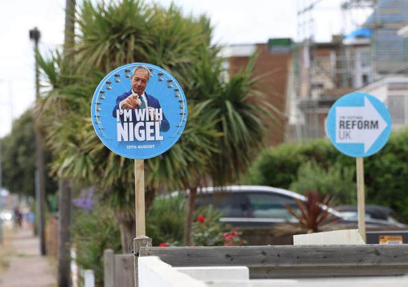 July 26, 2026, Clacton-On-Sea, Essex, UK: Clacton-On-Sea, UK. Reform UK, campaign placards outside a house in Clacton-on-sea, Essex. Nigel Farage has resigned his seat and is now campaigning to be re-elected in the Clacton constituency at the upcoming by-election on the 13th August. Clacton-On-Sea UK  - ZUMAl94_ 20260726_zaf_l94_004 Copyright: xJacquelinexLawriex
