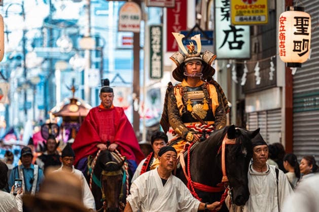 General view, July 26, 2026 - Participants carry a portable shrine (mikoshi) during the Mikoshi Togyo procession of the Sumiyoshi Matsuri at Sumiyoshi Taisha in Osaka, Japan. The annual procession is one of the festival s main events, as worshippers parade the sacred mikoshi through the surrounding streets as part of a centuries-old Shinto tradition.  aflo_339206520