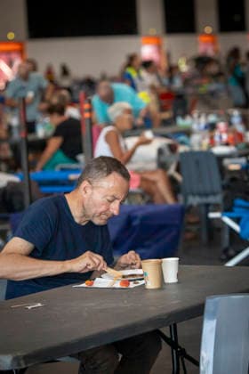 Thousands Of Gironde Wildfire Evacuees Sheltered At The Bordeaux Exhibition Centre Thousands of people evacuated from their homes rest at the Bordeaux Exhibition Centre, which has been converted into a temporary emergency shelter following a major wildfire affecting the Gironde department in southwestern France on Saturday. French authorities have transformed the exhibition halls into an emergency reception facility to accommodate families displaced from several municipalities, providing medical assistance, food and psychological support, while firefighters continue efforts to contain the fire, which has forced the evacuation of tens of thousands of people. In Bordeaux, France, on July 26, 2026. Burdeaux France  Copyright: xAlbertxLlopx originalFilename: salame-thousand260726_nplFn.jpg