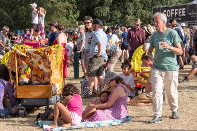 July 26, 2026, Corsham, Wiltshire, England: Festival goers enjoy a sunny Saturday at WOMAD Festival at Neston Park in Wiltshire. Corsham United Kingdom  - ZUMAr169 20260726_zip_r169_015 Copyright: xRodxHarbinsonx