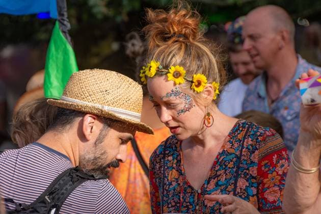 July 26, 2026, Corsham, Wiltshire, England: Festival goers enjoy a sunny Saturday at WOMAD Festival at Neston Park in Wiltshire. Corsham United Kingdom  - ZUMAr169 20260726_zip_r169_009 Copyright: xRodxHarbinsonx