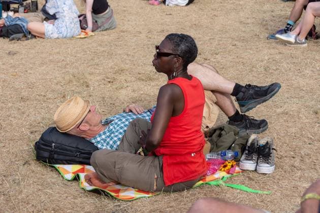 July 26, 2026, Corsham, Wiltshire, England: Festival goers enjoy a sunny Saturday at WOMAD Festival at Neston Park in Wiltshire. Corsham United Kingdom  - ZUMAr169 20260726_zip_r169_010 Copyright: xRodxHarbinsonx