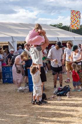 July 26, 2026, Corsham, Wiltshire, England: Festival goers enjoy a sunny Saturday at WOMAD Festival at Neston Park in Wiltshire. Corsham United Kingdom  - ZUMAr169 20260726_zip_r169_018 Copyright: xRodxHarbinsonx