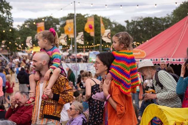 July 26, 2026, Corsham, Wiltshire, England: Festival goers enjoy a sunny Saturday at WOMAD Festival at Neston Park in Wiltshire. Corsham United Kingdom  - ZUMAr169 20260726_zip_r169_019 Copyright: xRodxHarbinsonx