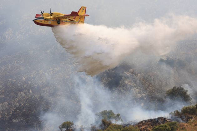 Firefighters battle wildfire near Italy s Palermo PALERMO, ITALY - JULY 26: Firefighter crews launched an aerial and ground response to contain a wildfire that broke out in scrubland near Torretta, outside Palermo on the island of Sicily, Italy on July 26, 2026. Fire engines and two firefighting aircraft were deployed as the blaze threatened nearby residential areas. Alberto Lo Bianco Anadolu Sicily Italy. Editorial use only. Please get in touch for any other usage.  Copyright: x2026xAnadoluxAlbertoxLoxBiancox