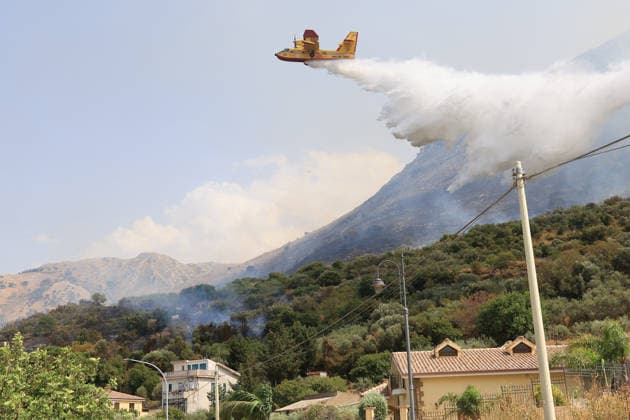 Firefighters battle wildfire near Italy s Palermo PALERMO, ITALY - JULY 26: Firefighter crews launched an aerial and ground response to contain a wildfire that broke out in scrubland near Torretta, outside Palermo on the island of Sicily, Italy on July 26, 2026. Fire engines and two firefighting aircraft were deployed as the blaze threatened nearby residential areas. Alberto Lo Bianco Anadolu Sicily Italy. Editorial use only. Please get in touch for any other usage.  Copyright: x2026xAnadoluxAlbertoxLoxBiancox