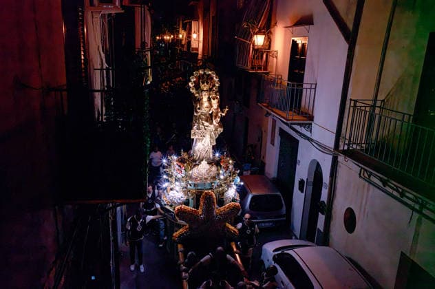 Solemn Procession of Our Lady of Mount Carmel in Palermo PALERMO, ITALY - JULY 26: Solemn Procession of the Silver Statue of the Our Lady of Mount Carmel from the Church of Carmine Maggiore, through the Old Ballaro Market and through the streets of the city, organised by the Venerable Confraternity of Our Lady of Mount Carmel, founded in 1735 on July 26, 2026 in Palermo, Italy. Palermo Sicily Italy Copyright: xStefanoxMontesix