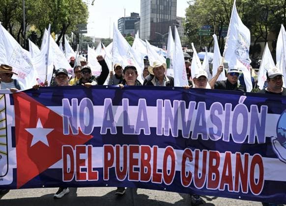 (260726) -- MEXICO CITY, July 26, 2026 -- Protesters march during a demonstration in support of Cuba and against U.S. embargo on Cuba, in Mexico City, Mexico on July 26, 2026. The demonstration aimed to commemorate the 73rd anniversary of the assault on Moncada and Carlos Manuel de Cespedes garrisons that took place on July 26, 1953, seen as the beginning of the Cuban Revolution. ) MEXICO-MEXICO CITY-SUPPORT CUBA WuxWei 
