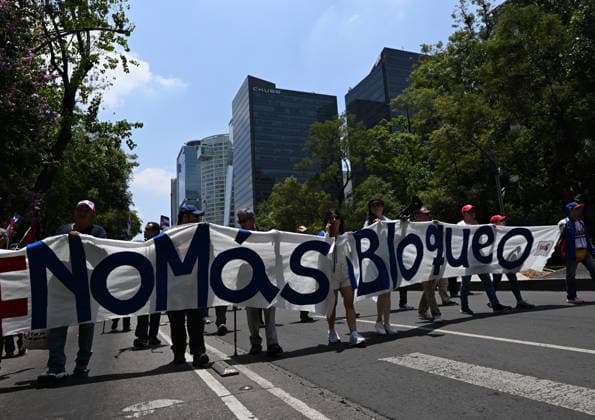(260726) -- MEXICO CITY, July 26, 2026 -- Protesters march during a demonstration in support of Cuba and against U.S. embargo on Cuba, in Mexico City, Mexico on July 26, 2026. The demonstration aimed to commemorate the 73rd anniversary of the assault on Moncada and Carlos Manuel de Cespedes garrisons that took place on July 26, 1953, seen as the beginning of the Cuban Revolution. ) MEXICO-MEXICO CITY-SUPPORT CUBA WuxWei 
