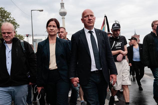 July 26, 2026, Berlin, Germany: Berlin Mayor Kai Wegner and his wife take part in a mourning march from St. Mary™s Church to the Brandenburg Gate for the victims of the CSD Pride parade attack. On the evening of July 25, a car drove into people in Tiergarten park, killing one person and injuring 29 others. Authorities are searching for the suspected attacker. Berlin Germany  - ZUMAs197 20260726_aaa_s197_133 Copyright: xVasilyxKrestyaninovx