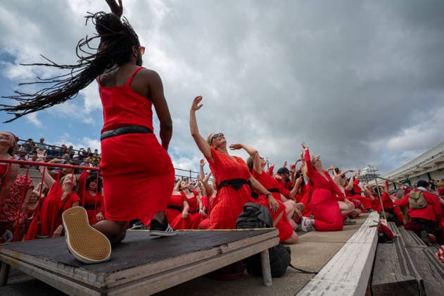 July 26, 2026, Folkstone, Kent, United Kingdom: Participants dressed as Cathy takes part in the Most Wuthering Heights Day Ever in Folkestone. Folkestone once again hosted The Most Wuthering Heights Day Ever, as hundreds of participants dressed in flowing red gathered to recreate the iconic dance from Kate Bush s 1978 hit, Wuthering Heights. Continuing a tradition that began in 2018, the event welcomed both returning dancers and newcomers, celebrating music, creativity, and community while transforming the Harbour Arm into a sea of red. Folkstone United Kingdom  - ZUMAs197 20260726_aaa_s197_144 Copyright: xJamesxWilloughbyx