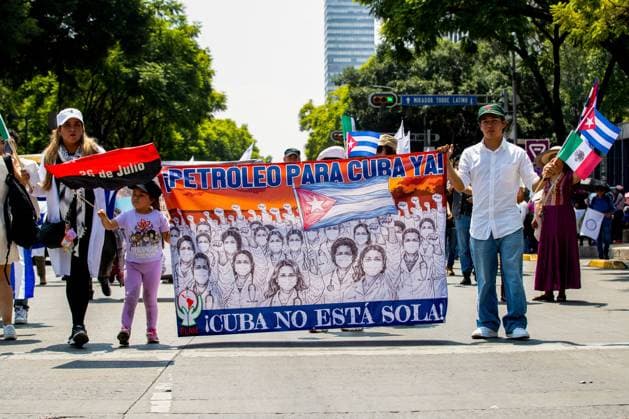 July 26, 2026, Mexico City, Mexico: MEXICO Mexico City, MEXICO Ã¢â‚¬ JULY 26, 2026: Demonstrators, including members of the Cuban community in Mexico and activists from various organisations, march from Plaza Palestina Libre to the U.S. Consulate in Mexico City to call for an end to the U.S. embargo on Cuba. During the demonstration, participants expressed support for Cuban sovereignty and criticised U.S. policy toward Cuba and broader U.S. involvement in Latin America. Mexico City Mexico  - ZUMAq101 20260726_zna_q101_227 Copyright: xAddixSetyawanx