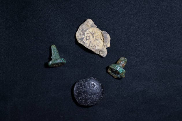Gold amulet, ancient seal unearthed at Turkmen Karahoyuk excavation in Turkiye s Konya KONYA, TURKIYE - JULY 26: A 3,500-year-old seal inscribed with Luwian hieroglyphs (top) and other artifacts unearthed during excavations at the Turkmen Karahoyuk archaeological site are displayed in the Cumra district of Konya, Turkiye, on July 26, 2026. Archaeologists also discovered a gold amulet dating to the Roman period during the ongoing excavations at the ancient settlement. Serhat Cetinkaya Anadolu Konya Turkey. Editorial use only. Please get in touch for any other usage.  Copyright: x2026xAnadoluxSerhatxCetinkayax