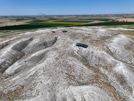 Gold amulet, ancient seal unearthed at Turkmen Karahoyuk excavation in Turkiye s Konya KONYA, TURKIYE - JULY 26: An aerial view of the Turkmen Karahoyuk archaeological site in the Cumra district of Konya, Turkiye, on July 26, 2026. Archaeologists conducting excavations at the ancient settlement recently uncovered a 3,500-year-old seal inscribed with Luwian hieroglyphs and a gold amulet dating to the Roman period, along with various other artifacts. Serhat Cetinkaya Anadolu Konya Turkey. Editorial use only. Please get in touch for any other usage.  Copyright: x2026xAnadoluxSerhatxCetinkayax