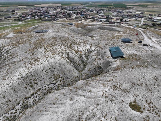 Gold amulet, ancient seal unearthed at Turkmen Karahoyuk excavation in Turkiye s Konya KONYA, TURKIYE - JULY 26: An aerial view of the Turkmen Karahoyuk archaeological site in the Cumra district of Konya, Turkiye, on July 26, 2026. Archaeologists conducting excavations at the ancient settlement recently uncovered a 3,500-year-old seal inscribed with Luwian hieroglyphs and a gold amulet dating to the Roman period, along with various other artifacts. Serhat Cetinkaya Anadolu Konya Turkey. Editorial use only. Please get in touch for any other usage.  Copyright: x2026xAnadoluxSerhatxCetinkayax