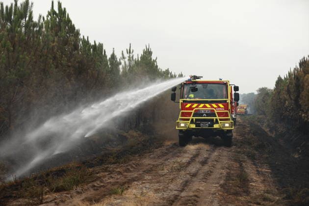 Gironde wildfire in southwestern France GIRONDE, FRANCE - JULY 27: Firefighting efforts continue after a massive wildfire in the Gironde department of southwestern France on July 27, 2026. Burned vehicles, damaged buildings, destroyed roads, and charred trees are seen across areas affected by the blaze. The wildfire caused widespread destruction as firefighters continued efforts to contain the flames. Authorities said the spread of the flames has been halted, but the wildfire remains active under difficult conditions. Mohamad Salaheldin Abdelghani Alsayed Anadolu Gironde France. Editorial use only. Please get in touch for any other usage.  Copyright: x2026xAnadoluxMohamadxSalaheldinxAbdelghanixAlsayedx