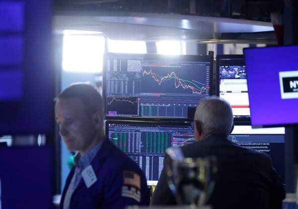 Traders work on the floor of the New York Stock Exchange on Wall Street on Monday, July 27, 2026 in New York City. The DOW began the day up over 600 points before falling back a bit but chip stocks. There was a pause in Iran fighting over the weekend.  NYP20260727102 JOHNxANGELILLO