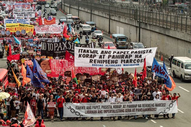 July 27, 2026, Quezon, Metro Manila, Philippines: Numbering in the thousands, multi-sectoral groups marched along Commonwealth Avenue for the Ã¢â‚¬ËœPeopleÃ¢â‚¬â ¢s SONAÃ¢â‚¬â ¢, coinciding with the 5th State of the Nation Address of Pres. Ferdinand Marcos Jr., July 27. Protesters called for greater accountability amidst government impunity, and the rejection of imperialist control of the United States over the Philippines in face of projects such as the Pax Silica Initiative which threatens to intensify issues of displacement and large-scale mining in the country. Quezon Philippines - ZUMAs383 20260727_zip_s383_002 Copyright: xNathanielxSorianox