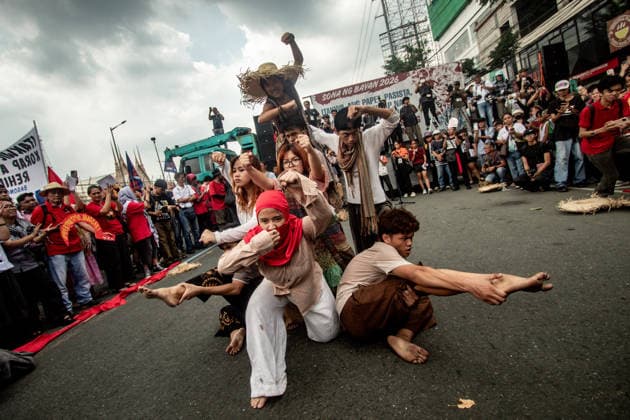 July 27, 2026, Quezon, Metro Manila, Philippines: Numbering in the thousands, multi-sectoral groups marched along Commonwealth Avenue for the Ã¢â‚¬ËœPeopleÃ¢â‚¬â ¢s SONAÃ¢â‚¬â ¢, coinciding with the 5th State of the Nation Address of Pres. Ferdinand Marcos Jr., July 27. Protesters called for greater accountability amidst government impunity, and the rejection of imperialist control of the United States over the Philippines in face of projects such as the Pax Silica Initiative which threatens to intensify issues of displacement and large-scale mining in the country. Quezon Philippines - ZUMAs383 20260727_zip_s383_005 Copyright: xNathanielxSorianox