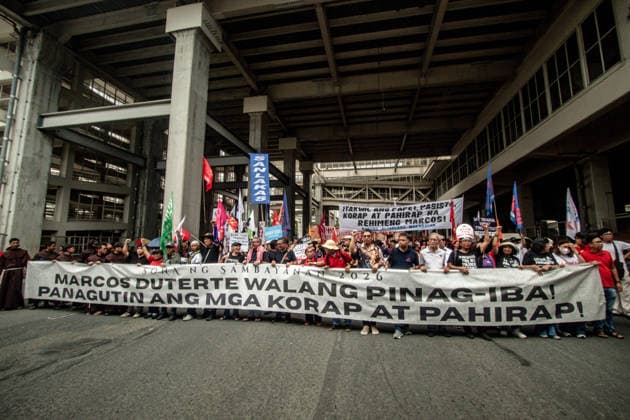 July 27, 2026, Quezon, Metro Manila, Philippines: Numbering in the thousands, multi-sectoral groups marched along Commonwealth Avenue for the Ã¢â‚¬ËœPeopleÃ¢â‚¬â ¢s SONAÃ¢â‚¬â ¢, coinciding with the 5th State of the Nation Address of Pres. Ferdinand Marcos Jr., July 27. Protesters called for greater accountability amidst government impunity, and the rejection of imperialist control of the United States over the Philippines in face of projects such as the Pax Silica Initiative which threatens to intensify issues of displacement and large-scale mining in the country. Quezon Philippines  - ZUMAs383 20260727_zip_s383_007 Copyright: xNathanielxSorianox