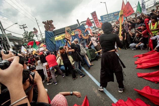 July 27, 2026, Quezon, Metro Manila, Philippines: Numbering in the thousands, multi-sectoral groups marched along Commonwealth Avenue for the Ã¢â‚¬ËœPeopleÃ¢â‚¬â ¢s SONAÃ¢â‚¬â ¢, coinciding with the 5th State of the Nation Address of Pres. Ferdinand Marcos Jr., July 27. Protesters called for greater accountability amidst government impunity, and the rejection of imperialist control of the United States over the Philippines in face of projects such as the Pax Silica Initiative which threatens to intensify issues of displacement and large-scale mining in the country. Quezon Philippines  - ZUMAs383 20260727_zip_s383_016 Copyright: xNathanielxSorianox