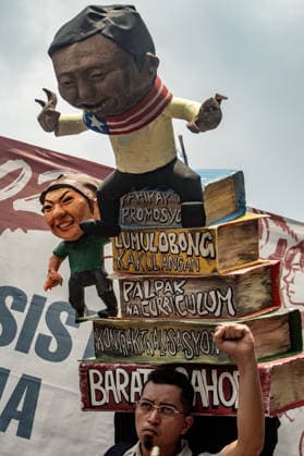 July 27, 2026, Quezon, Metro Manila, Philippines: Numbering in the thousands, multi-sectoral groups marched along Commonwealth Avenue for the Ã¢â‚¬ËœPeopleÃ¢â‚¬â ¢s SONAÃ¢â‚¬â ¢, coinciding with the 5th State of the Nation Address of Pres. Ferdinand Marcos Jr., July 27. Protesters called for greater accountability amidst government impunity, and the rejection of imperialist control of the United States over the Philippines in face of projects such as the Pax Silica Initiative which threatens to intensify issues of displacement and large-scale mining in the country. Quezon Philippines - ZUMAs383 20260727_zip_s383_009 Copyright: xNathanielxSorianox