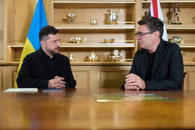 Ukrainian President Volodymyr Zelenskyy meets with new UK Prime Minister Andy Burnham at Portsmouth Naval Base, in Portsmouth, England, on Monday, July 27, 2026, where they toured the Royal Navy aircraft carrier HMS Queen Elizabeth. Photo via Ukrainian Presidential Press Office  WAX2026072703 UKRAINIANxPRESIDENTIALxPRESSxOFFICE
