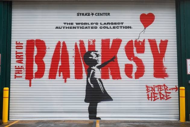 July 27, 2026, Tampa, Florida, USA: A mural for the Art of Banksy exhibition is displayed outside of the Straz Center on Monday, July 27, 2026, in Tampa. Tampa USA - ZUMAs70_ 20260727_zan_s70_010 Copyright: xJeffereexWoox
