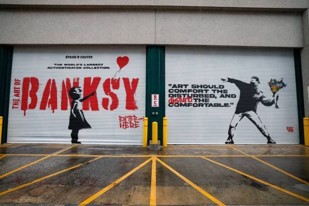 July 27, 2026, Tampa, Florida, USA: A mural for the Art of Banksy exhibition is displayed outside of the Straz Center on Monday, July 27, 2026, in Tampa. Tampa USA  - ZUMAs70_ 20260727_zan_s70_011 Copyright: xJeffereexWoox