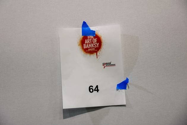 July 27, 2026, Tampa, Florida, USA: A temporary sign is placed on a display wall where an art piece by street artist, Banksy, will be hung at the Straz Center on Monday, July 27, 2026, in Tampa. Tampa USA - ZUMAs70_ 20260727_zan_s70_015 Copyright: xJeffereexWoox