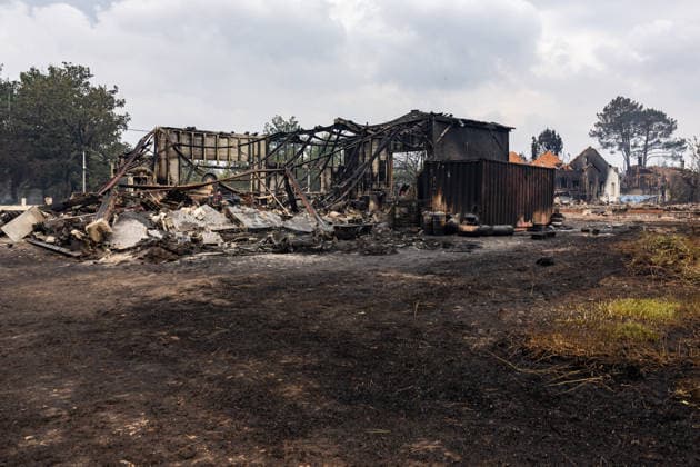 Burned Properties After The Gironde Wildfires - Lege Burned residential properties are seen after the passage of the wildfire, smoke continues to rise from the affected areas as firefighters monitor remaining hotspots in Lège, France, on July 27, 2026. Photo by Margot Le Gonidec ABACAPRESS.COM Lège France  Copyright: xLexGonidecxMargot ABACAx