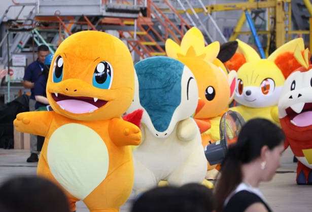 July 28, 2026, Tokyo, Japan - Mokemon characters dance as Japan s largest air carrier All Nippon Airways (ANA) displays the special designed aircraft with Pokemon characters Red Pokemon Jet to mark the 30th annivrersary of the partnership of ANA and Pokemon at the ANA hangar near the Haneda airport in Tokyo on Tuesday, July 28, 2026. ANA will start domestic flight services of Red Pokemon Jet from July 29. (photo by Yoshio Tsunoda AFLO)  aflo_339375454