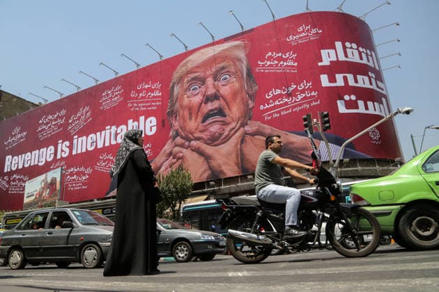 Giant revenge billboard targeting Trump erected in central Tehran TEHRAN, IRAN – JULY 28: A view of a giant billboard depicting U.S. President Donald Trump with the words Revenge Is Inevitable displayed at the intersection of Jomhuri Street and Vali-e Asr Street in Tehran, Iran, on July 28, 2026. Fatemeh Bahrami Anadolu Tehran Iran. Editorial use only. Please get in touch for any other usage.  Copyright: x2026xAnadoluxFatemehxBahramix