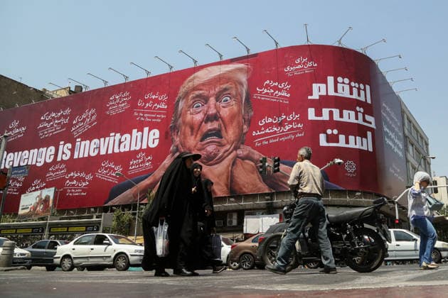 Giant revenge billboard targeting Trump erected in central Tehran TEHRAN, IRAN – JULY 28: Pedestrians walk past a giant billboard depicting U.S. President Donald Trump and the words Revenge is inevitable at the intersection of Jomhuri Street and Vali-e Asr Street in Tehran, Iran, on July 28, 2026. Fatemeh Bahrami Anadolu Tehran Iran. Editorial use only. Please get in touch for any other usage.  Copyright: x2026xAnadoluxFatemehxBahramix