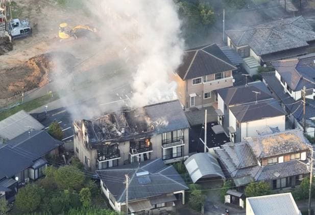 Strong quake jolts southwestern Japan+ Photo taken on July 28, 2026, shows smoke rising from a building in Yatsushiro, Kumamoto Prefecture, after a magnitude 7.1 earthquake shook the southwestern Japan prefecture.  A14AA0005624331P