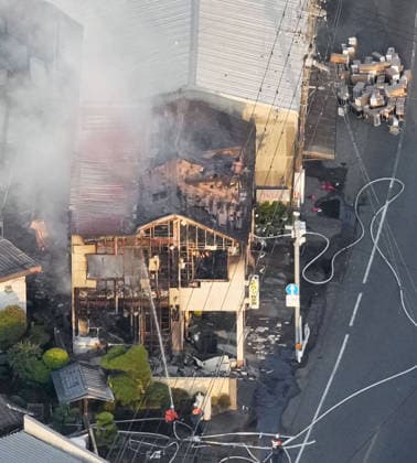 Strong quake jolts southwestern Japan+ Photo taken from a Kyodo News helicopter on July 28, 2026, shows smoke rising from a building in Yatsushiro, Kumamoto Prefecture, after a magnitude 7.1 earthquake shook the southwestern Japan prefecture.  A14AA0005624332P