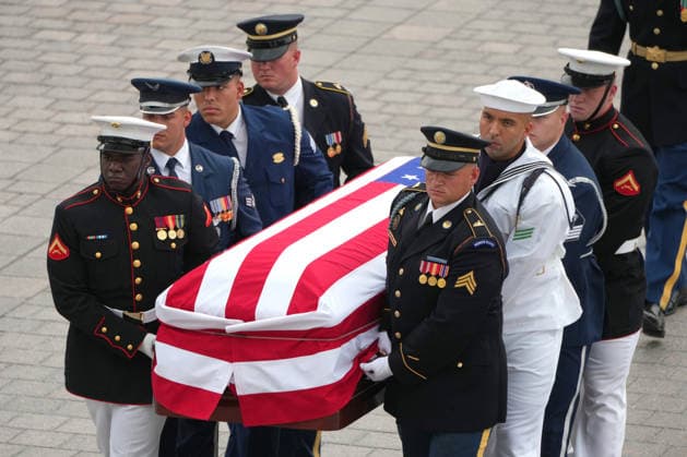 An Armed Forces Body Bearer Team moves the casket of Sen. Lindsey Graham, R-S.C., upon arrival for a Congressional tribute in the Rotunda of the U.S. Capitol, Tuesday, July 28, 2026, in Washington. Graham, who served in Congress for 31 years, died on July 11 at the age of 71. Pool photo by Mark Schiefelbein  WAX20260728708 MarkxSchiefelbein