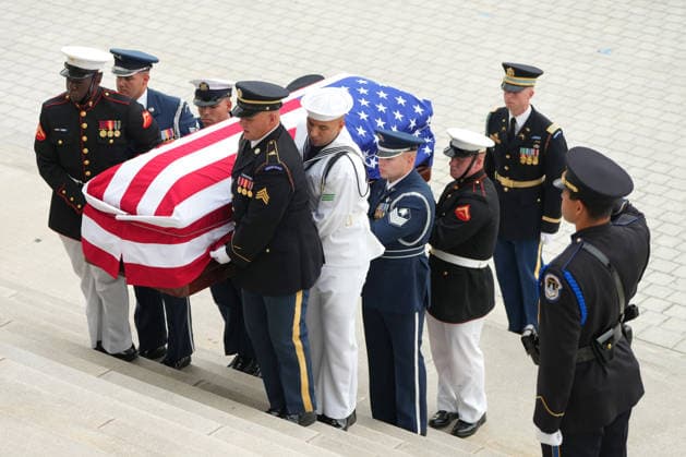 An Armed Forces Body Bearer Team moves the casket of Sen. Lindsey Graham, R-S.C., upon arrival for a Congressional tribute in the Rotunda of the U.S. Capitol, Tuesday, July 28, 2026, in Washington. Graham, who served in Congress for 31 years, died on July 11 at the age of 71. Pool photo by Mark Schiefelbein  WAX20260728709 MarkxSchiefelbein