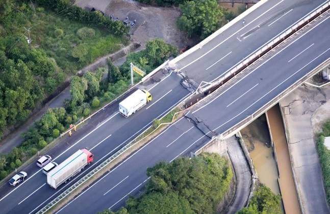 Strong quake jolts southwestern Japan Photo taken from a Kyodo News helicopter on July 28, 2026, shows a cracked expressway in Yatsushiro, Kumamoto Prefecture, after a magnitude 7.1 earthquake shook the southwestern Japan prefecture.  A14AA0005624333P