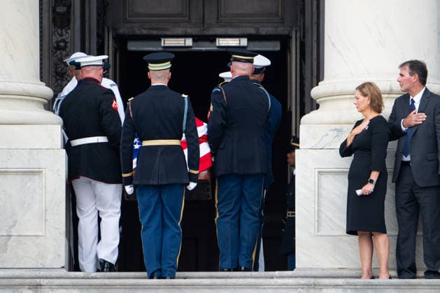 Sen. Lindsey Graham Congressional Tribute UNITED STATES - JULY 28: Sen. Darline Graham, R-S.C., and her husband Larry Nordone look on as the Armed Forces Body Bearer Team carries the body of her deceased brother Sen. Lindsey Graham, R-S.C., up the U.S. Capitol steps to the Congressional tribute in the U.S. Capitol Rotunda on Tuesday, July 28, 2026. Sen. Lindsey Graham died on July 11th from an aortic dissection. (Bill Clark CQ Roll Call) Washington DC United States EDITORIAL USE ONLY Copyright: x 2026xCQxRollxCallx BillxClarkx rollcallpix172256