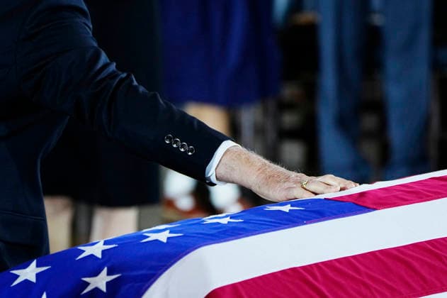 Family members touch the casket during a Congressional Tribute to honor the late Sen. Lindsey Graham in the Rotunda of the U.S. Capitol in Washington DC on Tuesday, July 28, 2026. Graham, who served South Carolina in Congress for 31 years, died on July 11 at the age of 71.  WAP20260728945 BONNIExCASH