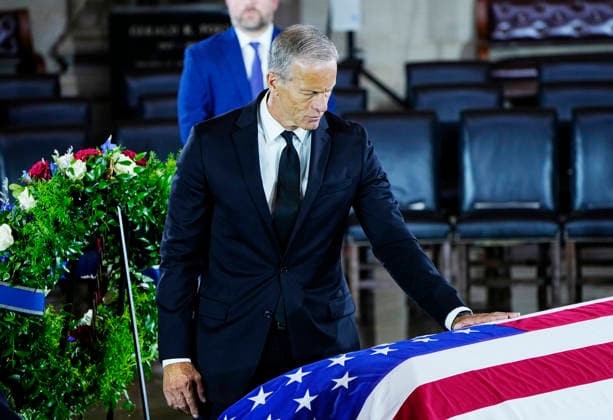 Senate Majority Leader John Thune pays his respects during a Congressional Tribute to honor the late Sen. Lindsey Graham in the Rotunda of the U.S. Capitol in Washington DC on Tuesday, July 28, 2026. Graham, who served South Carolina in Congress for 31 years, died on July 11 at the age of 71.  WAP20260728949 BONNIExCASH